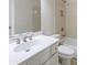 Bright bathroom boasts a white vanity, tiled shower, and toilet at 4742 Legacy Cove Ln, Smyrna, GA 30126