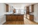 Spacious kitchen with granite countertops, stainless steel appliances, and wood cabinets at 4742 Legacy Cove Ln, Smyrna, GA 30126