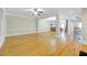 Expansive living room features hardwood floors, and open floor plan, with decorative trim at 4742 Legacy Cove Ln, Smyrna, GA 30126