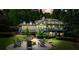 Expansive backyard with a patio, chairs, and firepit perfect for outdoor enjoyment and relaxation at 627 Apache Trl, Woodstock, GA 30189