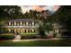 Charming home exterior featuring a well-manicured lawn, classic architecture, and inviting curb appeal at 627 Apache Trl, Woodstock, GA 30189