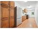 Convenient laundry room with ample storage, modern appliances, and a utility sink at 627 Apache Trl, Woodstock, GA 30189
