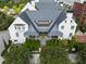 Stunning aerial view of this elegant home featuring a gray roof, white exterior, and meticulously landscaped surroundings at 201 Dovecrest Dr, Atlanta, GA 30305