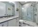 Updated bathroom with marble tile shower and modern vanity at 201 Dovecrest Dr, Atlanta, GA 30305