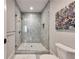 Elegant modern shower with marble tile surround, rain shower head, and built-in niche at 201 Dovecrest Dr, Atlanta, GA 30305