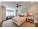 Bright bedroom with a large bed, shuttered windows, recessed lighting, and a neutral color palette at 201 Dovecrest Dr, Atlanta, GA 30305