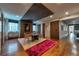 Contemporary dining area with wood floors, modern lighting, and a decorative wall at 201 Dovecrest Dr, Atlanta, GA 30305