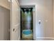 Convenient residential elevator with wood-paneled interior and patterned floor, offering easy access between floors at 201 Dovecrest Dr, Atlanta, GA 30305