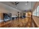 Bright home gym features ample space and equipment for a complete workout, with hardwood floors at 201 Dovecrest Dr, Atlanta, GA 30305