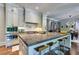 Kitchen with granite island, stainless appliances, seating, and ample storage at 201 Dovecrest Dr, Atlanta, GA 30305