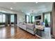 Bright living room with hardwood floors, fireplace, and plenty of natural light at 201 Dovecrest Dr, Atlanta, GA 30305