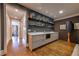 Elegant wet bar with custom cabinetry and plenty of storage for entertaining at 201 Dovecrest Dr, Atlanta, GA 30305