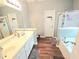 Double vanity bathroom with separate shower and tub at 2077 Appaloosa Way Way, Conyers, GA 30012
