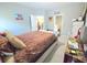 Relaxing bedroom with a comfortable bed and open doorway to another room at 2077 Appaloosa Way Way, Conyers, GA 30012