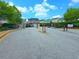 Community entrance to Greatwood Glen features a gate, signage, and well-maintained landscaping at 2077 Appaloosa Way Way, Conyers, GA 30012