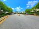Community entrance to Greatwood Glen features a gate, signage, and well-maintained landscaping at 2077 Appaloosa Way Way, Conyers, GA 30012