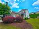 Inviting two-story home with brick accents, featuring a well-maintained lawn and colorful landscaping at 2077 Appaloosa Way Way, Conyers, GA 30012