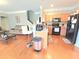 Cozy kitchen featuring modern appliances, breakfast bar, and seamless flow to living areas at 2077 Appaloosa Way Way, Conyers, GA 30012
