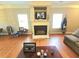 Bright living room with hardwood floors, fireplace, and modern decor at 2077 Appaloosa Way Way, Conyers, GA 30012