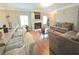 Inviting living room with breakfast bar, cozy seating, and a charming fireplace at 2077 Appaloosa Way Way, Conyers, GA 30012