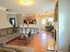 Inviting living room featuring hardwood floors, modern decor, and an open floor plan to the kitchen at 2077 Appaloosa Way Way, Conyers, GA 30012