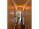 Hallway with hardwood floors and recessed lighting, leading to the home's living areas at 2170 Beecher Sw Cir, Atlanta, GA 30311