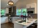 Updated kitchen with stainless steel appliances, custom cabinets, and quartz counters at 2170 Beecher Sw Cir, Atlanta, GA 30311