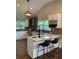 Modern kitchen with stainless appliances, a center island, and a stylish backsplash at 2170 Beecher Sw Cir, Atlanta, GA 30311