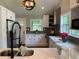 Modern kitchen featuring quartz countertops and stainless steel appliances at 2170 Beecher Sw Cir, Atlanta, GA 30311