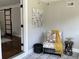 Cozy sitting area with decorative chair and view to bedroom at 2170 Beecher Sw Cir, Atlanta, GA 30311