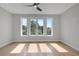 Bedroom featuring sunlit wood floors and large windows with nice view at 458 Connally Se St, Atlanta, GA 30312