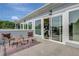 Deck showcasing an outdoor seating area with a peak into interior through large glass doors at 458 Connally Se St, Atlanta, GA 30312