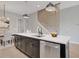 Modern kitchen with stainless steel appliances, gray cabinets, and a large island with seating at 458 Connally Se St, Atlanta, GA 30312