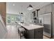 Modern kitchen features a large island with bar seating and stainless steel appliances at 458 Connally Se St, Atlanta, GA 30312