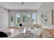 Bright living room boasts multiple windows with a stylish design and decor at 458 Connally Se St, Atlanta, GA 30312