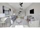 Modern living room featuring two ceiling fans and contemporary decor at 458 Connally Se St, Atlanta, GA 30312