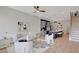 Bright living room open to the kitchen features contemporary decor and hardwood floors at 458 Connally Se St, Atlanta, GA 30312