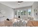Bright living room boasts multiple windows with a stylish design and decor at 458 Connally Se St, Atlanta, GA 30312