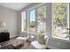 Bright sitting area featuring large windows with natural light and comfortable seating at 458 Connally Se St, Atlanta, GA 30312