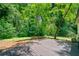 Spacious deck overlooking the lush, green, tree-lined backyard, perfect for outdoor entertaining at 481 Meadowbrook Se Dr, Marietta, GA 30067