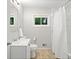 Bathroom featuring a neutral wall, window, and shower with curtain at 481 Meadowbrook Se Dr, Marietta, GA 30067