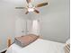 Bright bedroom with a ceiling fan, neutral walls and carpeted floor at 481 Meadowbrook Se Dr, Marietta, GA 30067