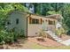 Charming home with brick exterior, shutters, manicured lawn, and inviting front entrance at 481 Meadowbrook Se Dr, Marietta, GA 30067