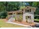 Charming home with brick exterior, shutters, manicured lawn, and inviting front entrance at 481 Meadowbrook Se Dr, Marietta, GA 30067