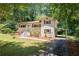 Charming home with brick exterior, shutters, manicured lawn, and inviting front entrance at 481 Meadowbrook Se Dr, Marietta, GA 30067