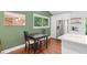 Modern kitchen nook featuring stainless steel refrigerator and light granite countertops at 481 Meadowbrook Se Dr, Marietta, GA 30067