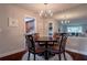 Charming dining area with a round table, seating for four, and view to the kitchen at 6851 Roswell Rd # G3, Atlanta, GA 30328