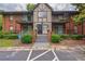 The apartment building has a classic facade with brick accents, balconies, and well-manicured landscaping at 6851 Roswell Rd # G3, Atlanta, GA 30328