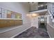Well-maintained hallway with mailboxes, and staircase leading to upper level. The space is bright with neutral walls at 6851 Roswell Rd # G3, Atlanta, GA 30328