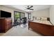 Bedroom with a large window, ceiling fan, and ample natural light, creating a comfortable retreat at 101 Bevil Ridge Se Rd, Emerson, GA 30137